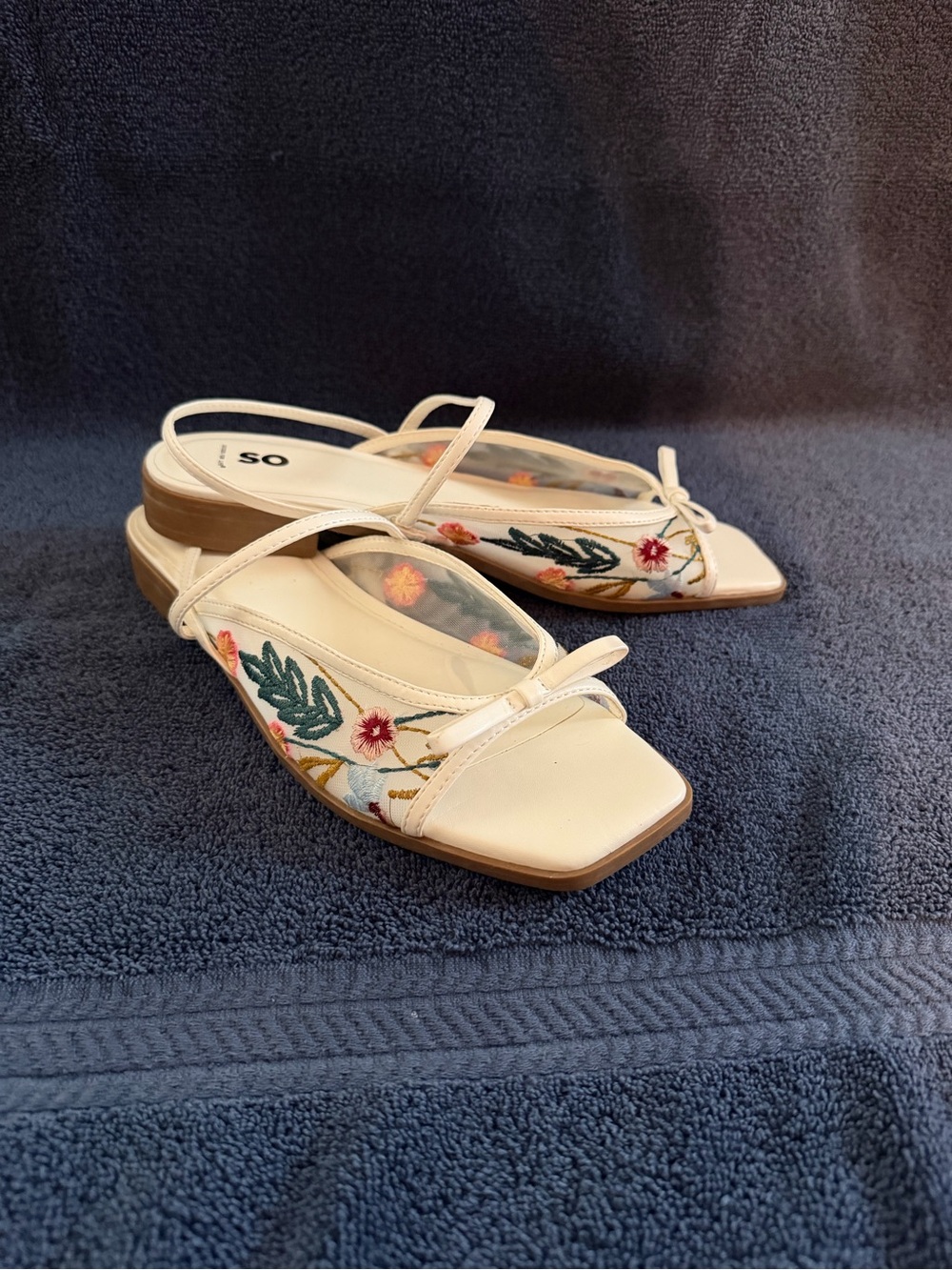 SO Cream Embroidered Slingback Mules with Bow Accent